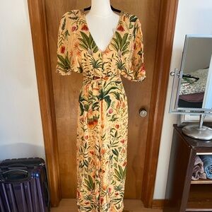Farm Rio/ Anthropologie Jumpsuit. Super cute on.! Has an open back. Runs big.